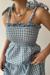 Strappy dress with checked pattern