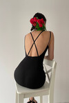Dress with crossed straps on the back