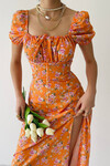 Slit dress with floral pattern